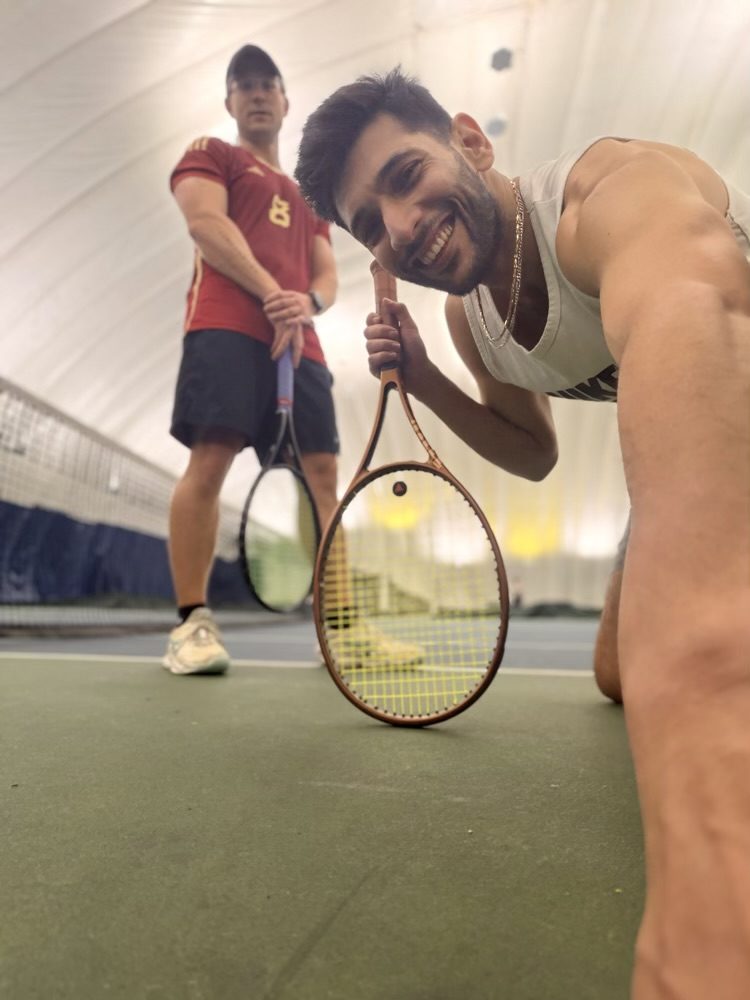 Raz playing tennis